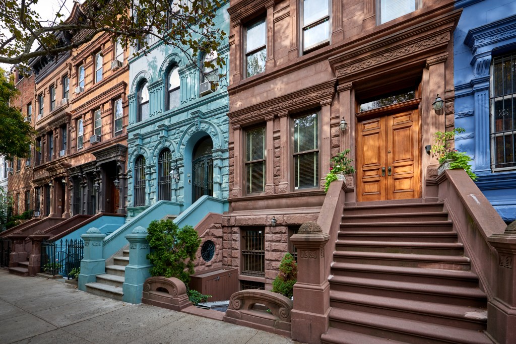 Row of historic brownstone townhouses in Manhattan.
