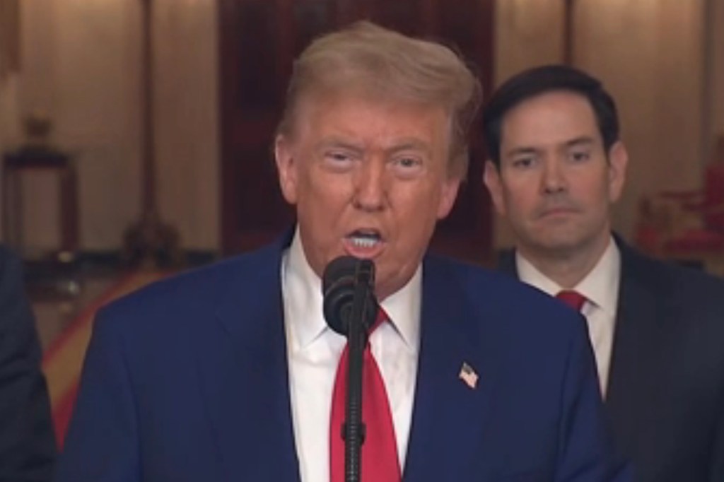Trump speaking at a podium at the White House.
