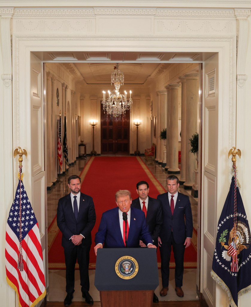President Trump addressing the nation at the White House with other officials.