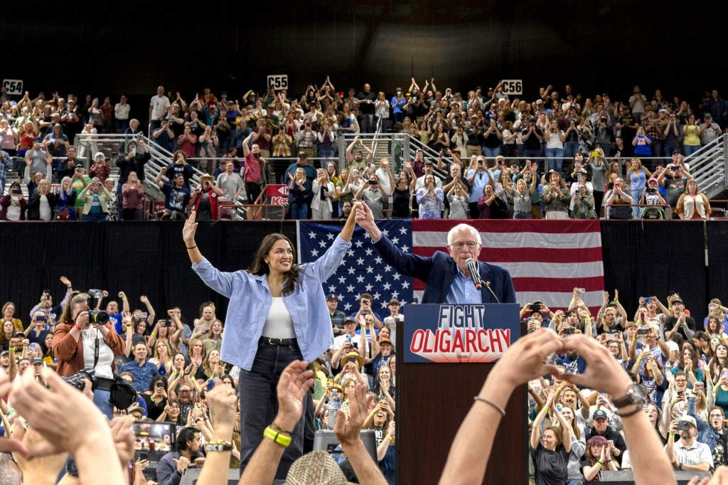 Bernie Sanders and Alexandria Ocasio-Cortez at a rally.