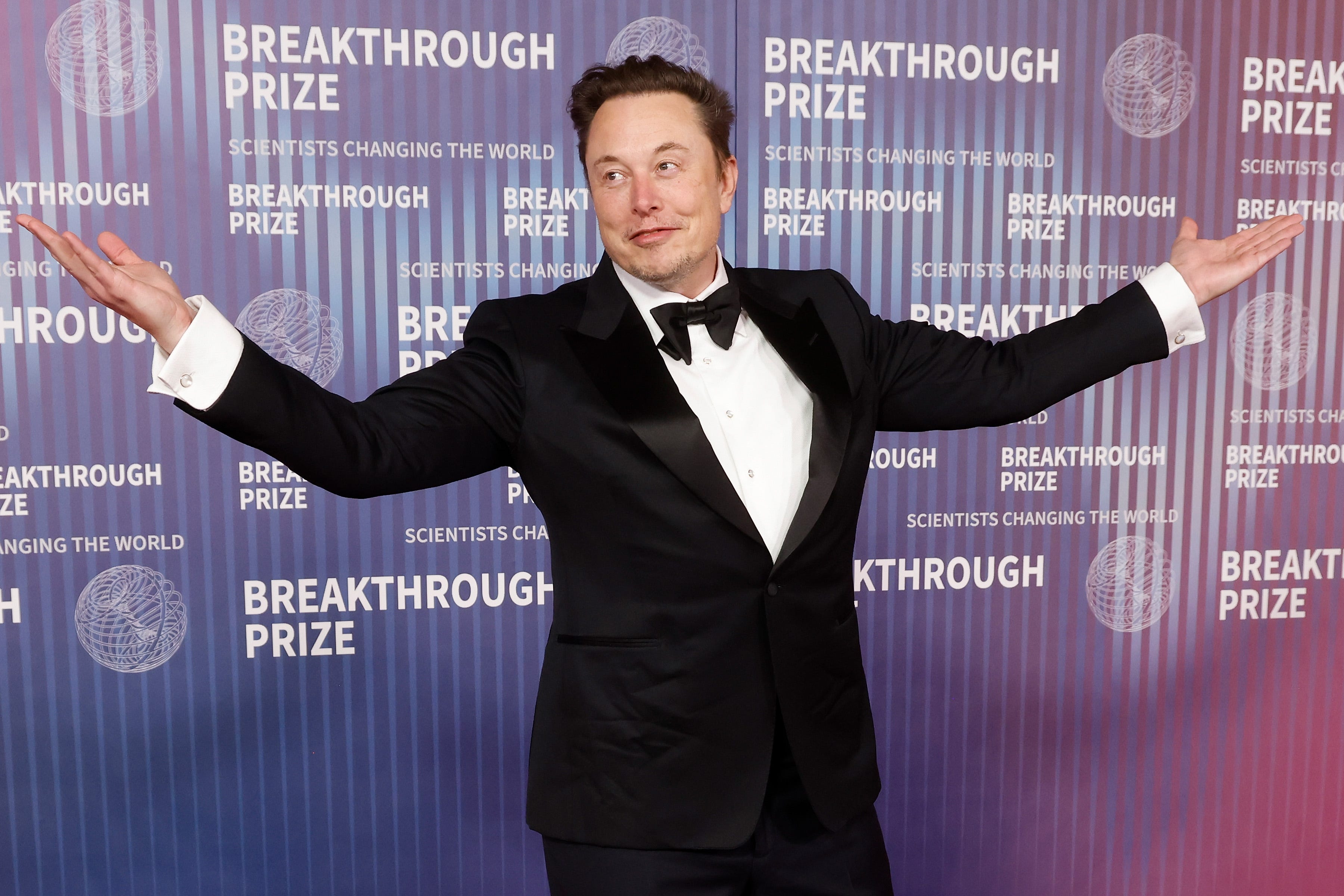 Elon Musk in a suit