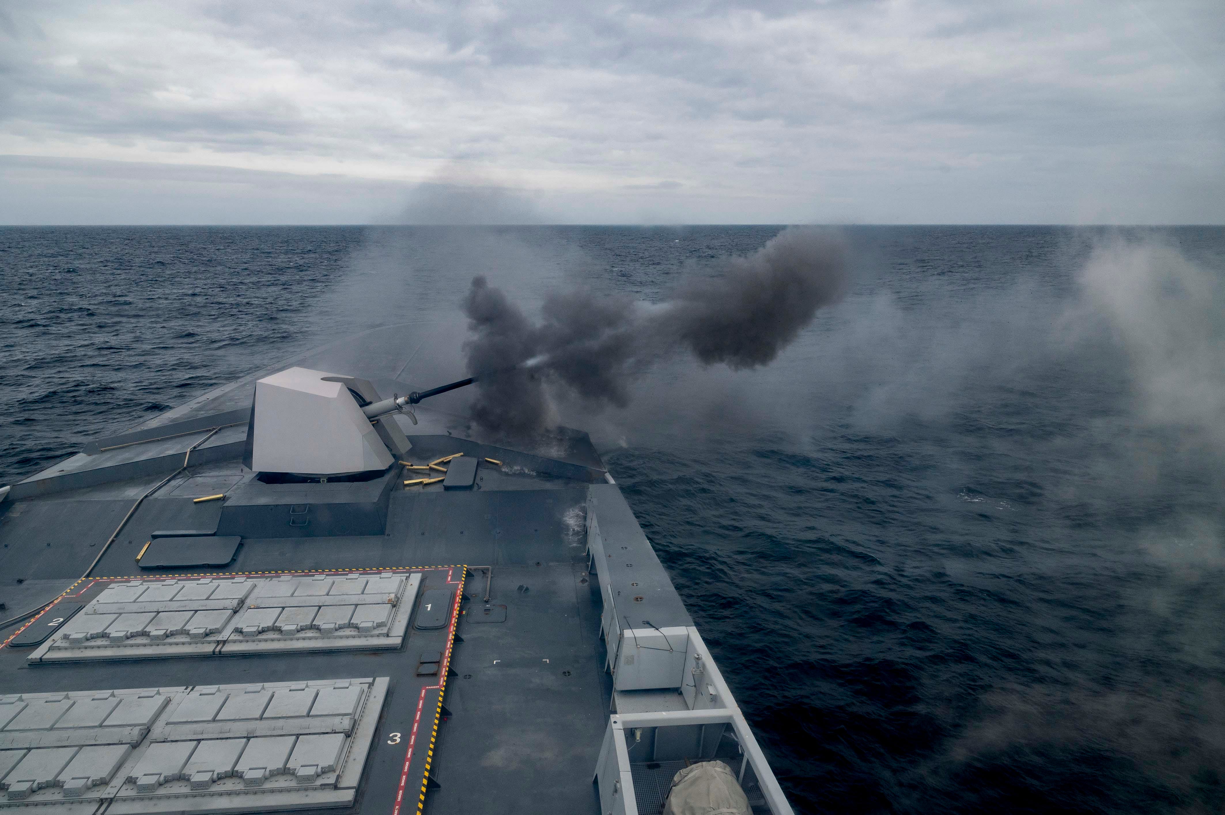 The French Navy Aquitaine-class frigate fires its five-inch gun while conducting a live-fire exercise during exercise At-Sea Demonstration (ASD) / Formidable Shield (FS) 2025.