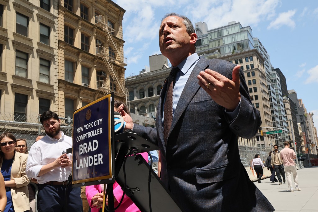 NYC Comptroller Brad Lander speaking at a press conference.