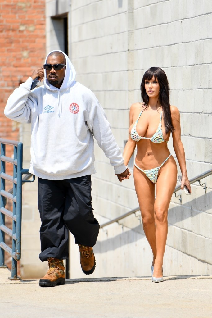 Kanye West and Bianca Censori arrive at a Brooklyn studio, with Bianca turning heads in a bikini made out of candy.