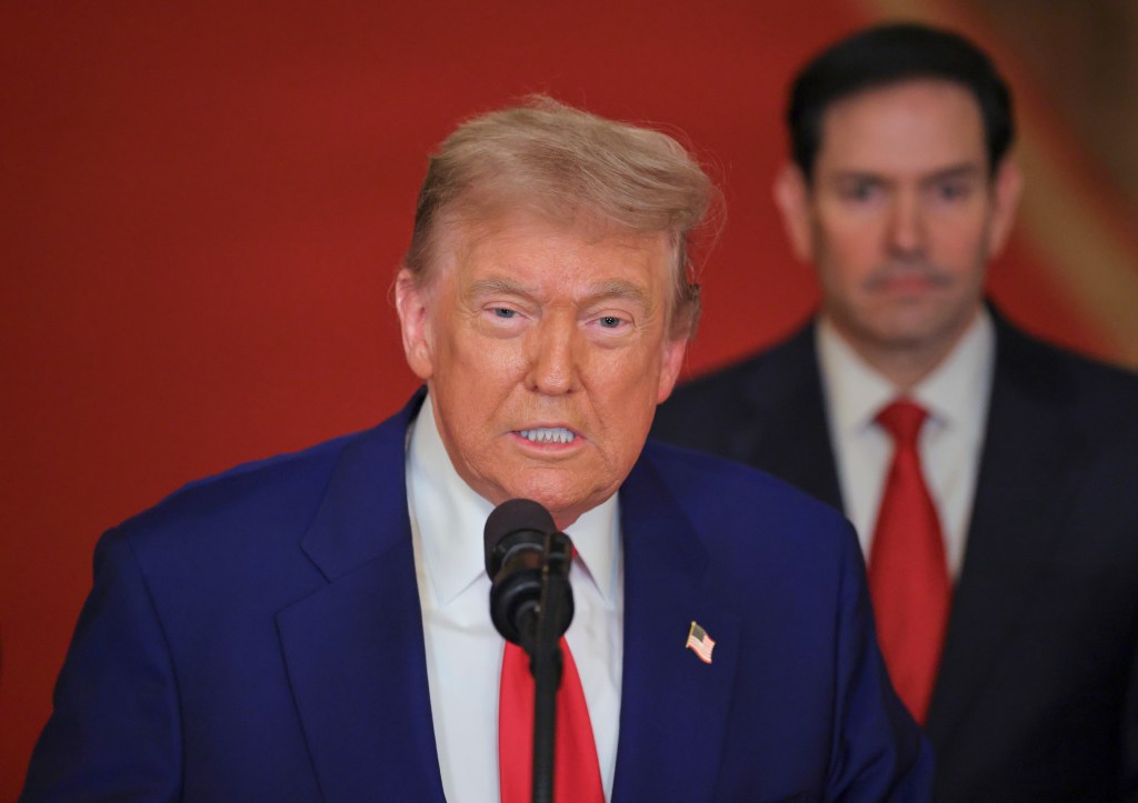 President Trump speaking at a podium.
