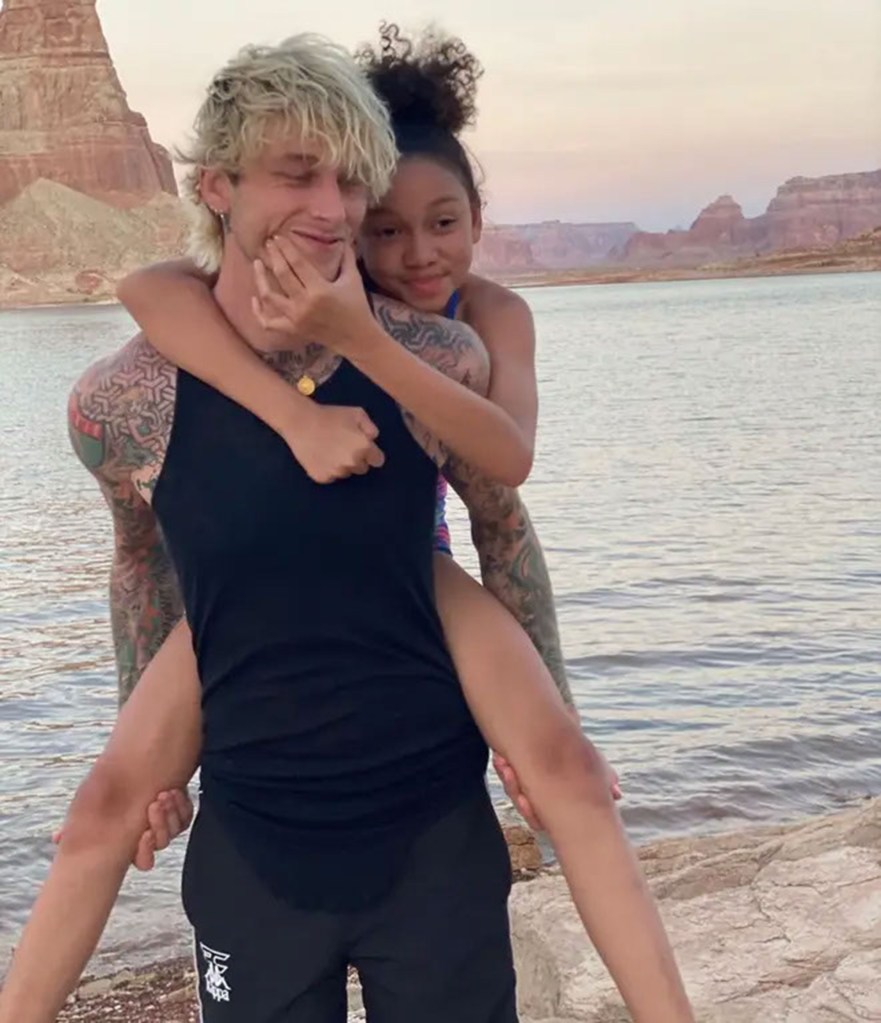 Machine Gun Kelly with his daughter.