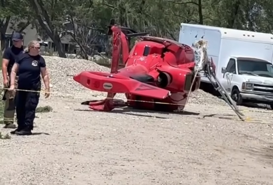 A red helicopter crashed near a Michigan lake.