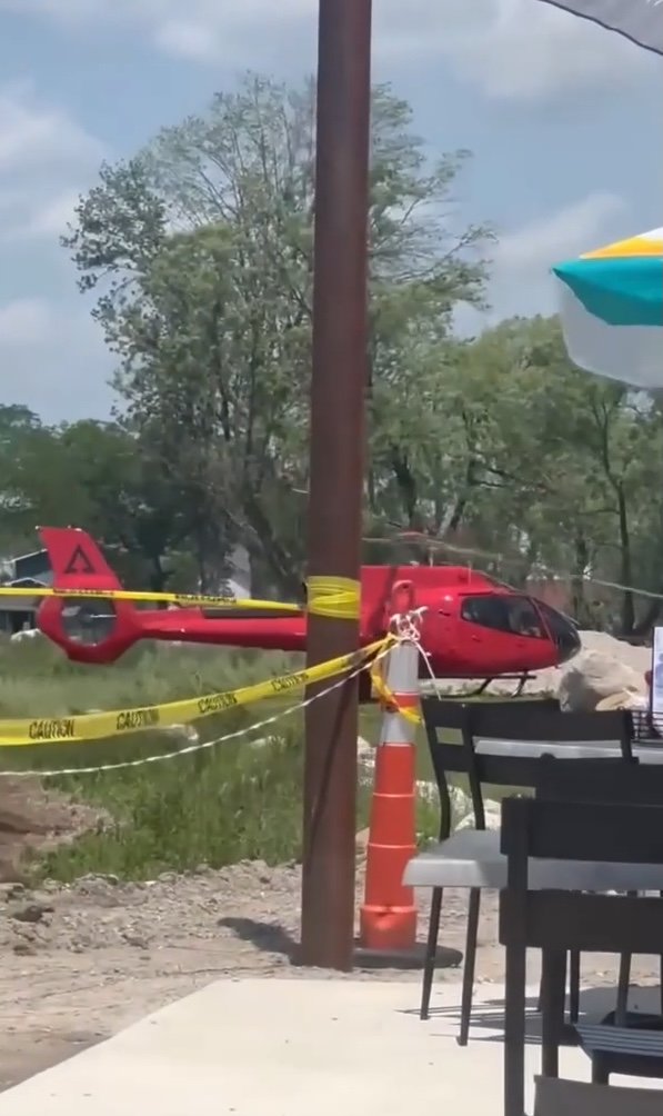 Helicopter crash near a Michigan lake.