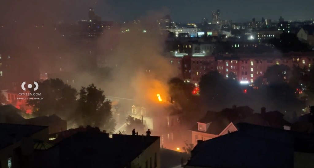 Flames roared out of the three homes as 198 firefighters worked desperately to keep the flames from spreading.