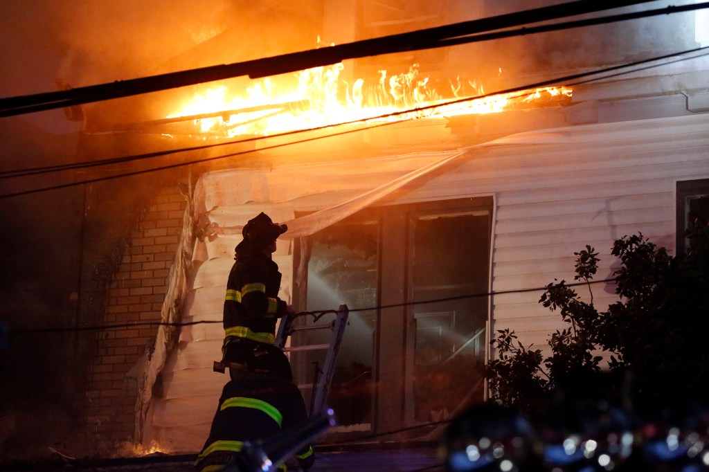The fire started at 7:24 p.m. on the first floor of 2462 Devoe Terrace in University Heights and quickly spread to the homes on either side, the FDNY said.