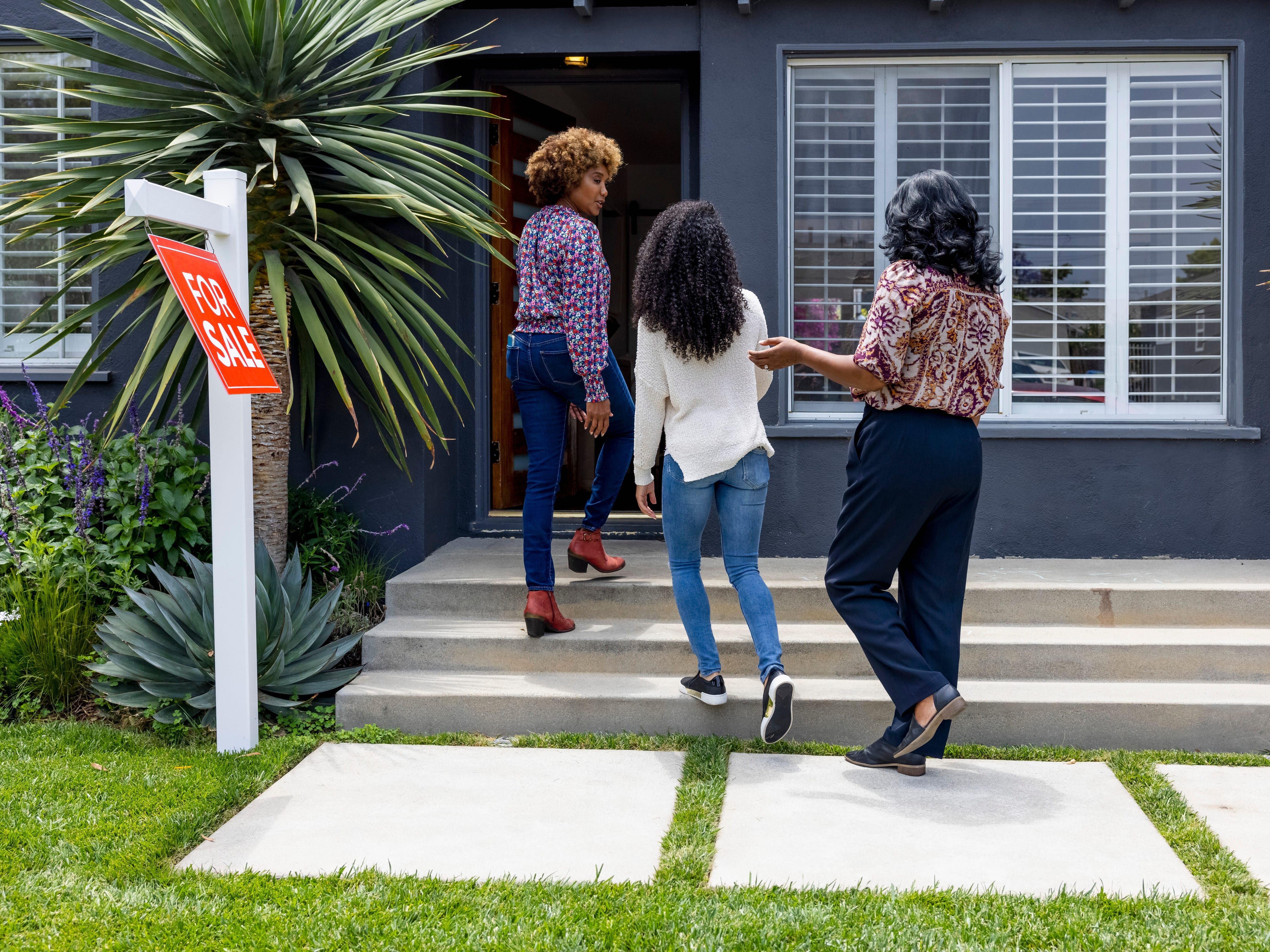 People looking at a home for sale