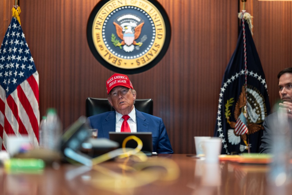 President Donald Trump and Secretary of State Marco Rubio (R) sit in the Situation Room as they monitor the mission that took out three Iranian nuclear enrichment sites, at the White House on June 21, 2025 in Washington, DC.