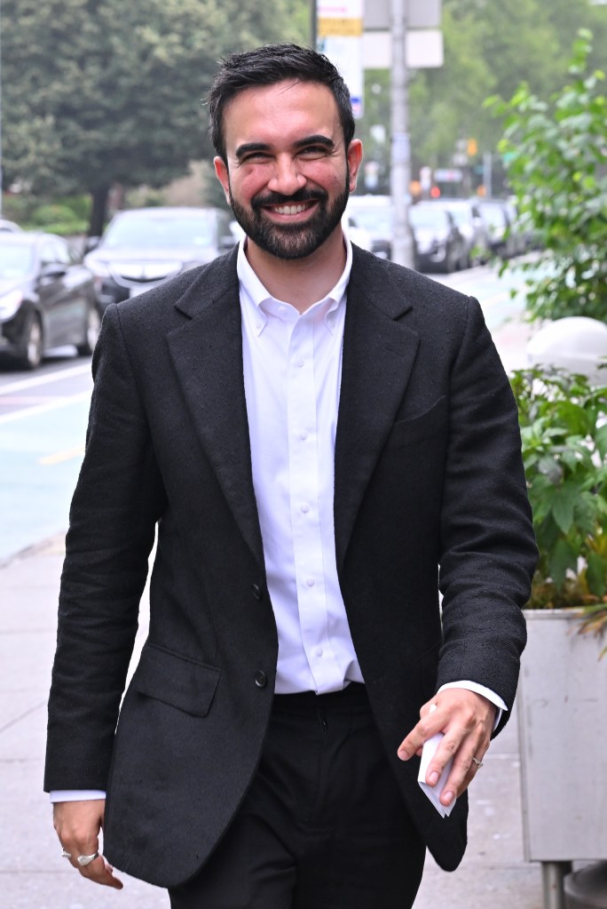 Zohran Mamdani, NYC mayoral candidate, smiling.