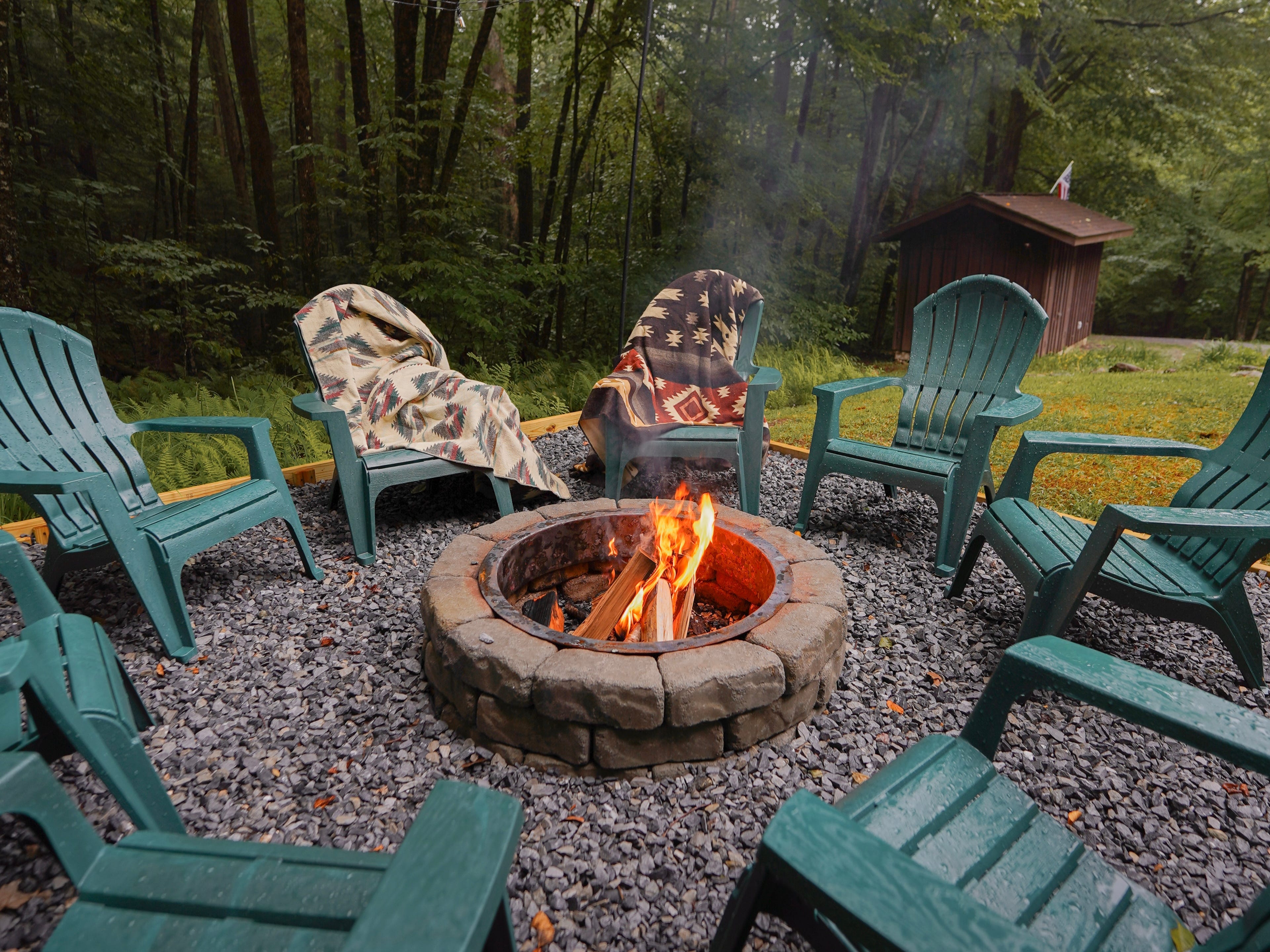 ADirondack chairs around a fire pit