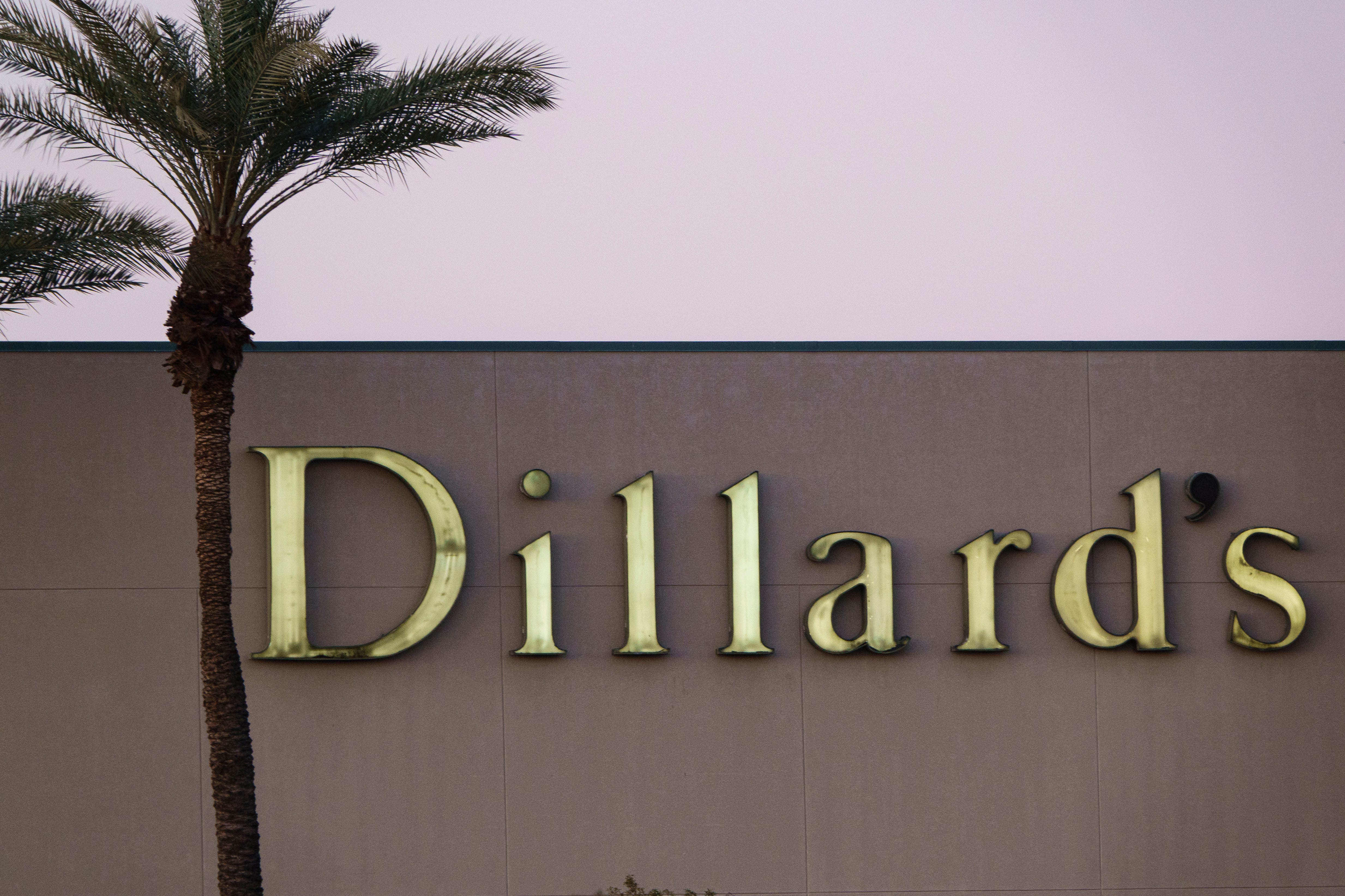 A Dillard's logo is displayed outside a department store on February 21, 2025 in Peoria, Arizona.