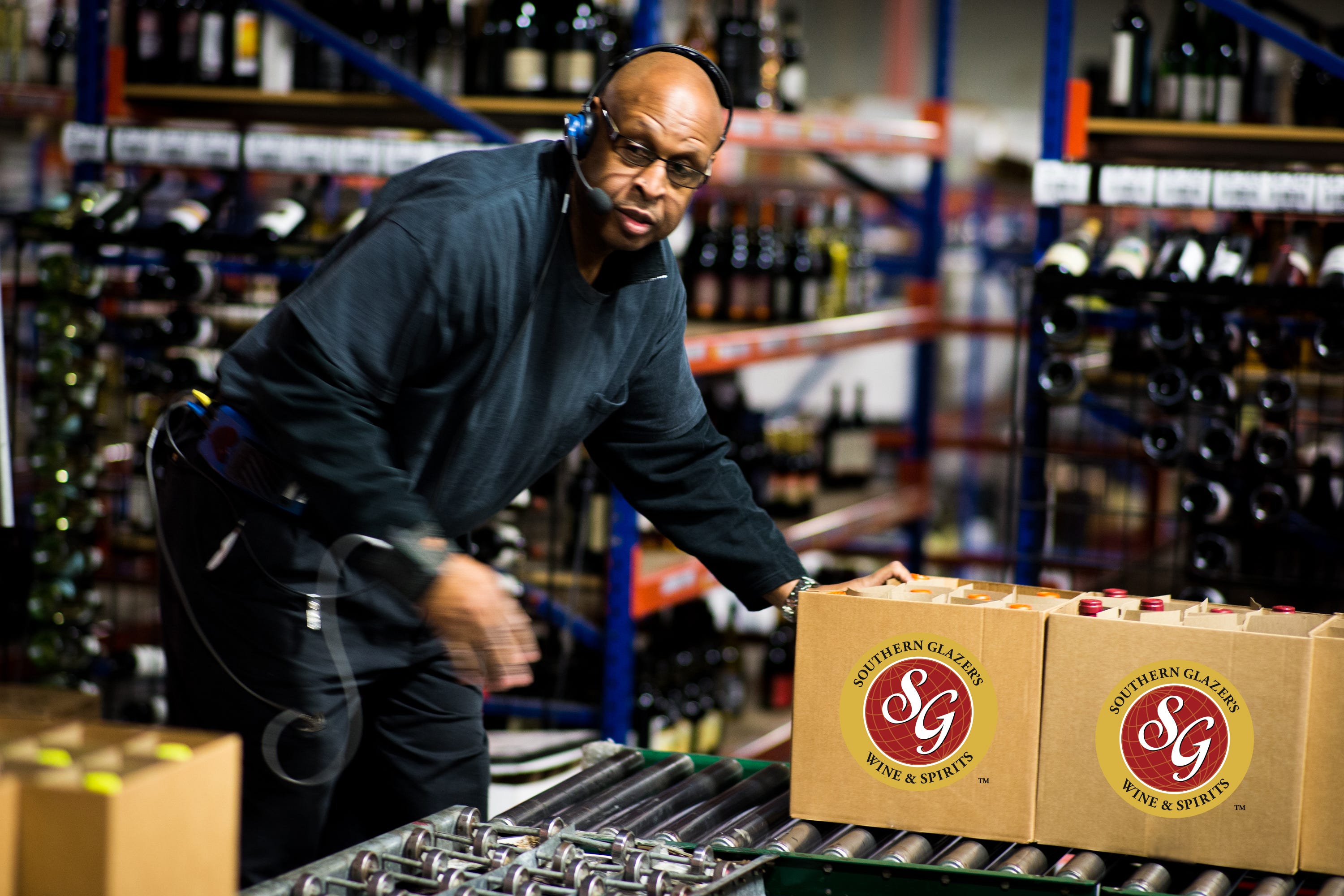A Southern Glazer's employee loads boxes at a warehouse.