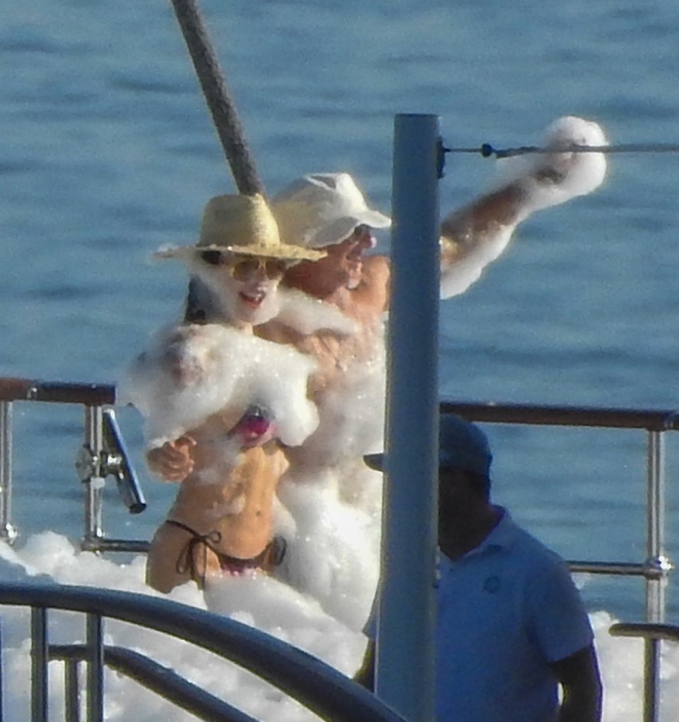Jeff Bezos and Lauren Sánchez at a foam party on his yacht in Europe Sunday while celebrating Evan's 19th birthday. 