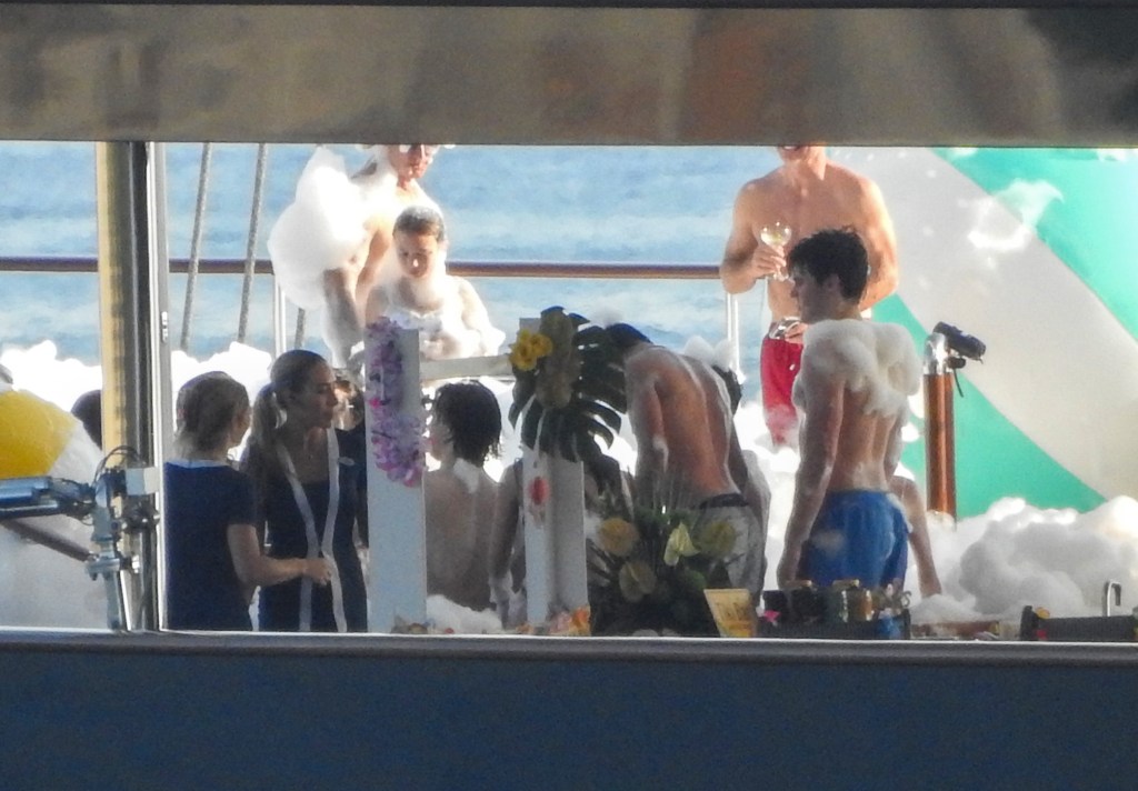 Jeff Bezos and Lauren Sánchez at a foam party on his yacht in Europe Sunday while celebrating Evan's 19th birthday. 