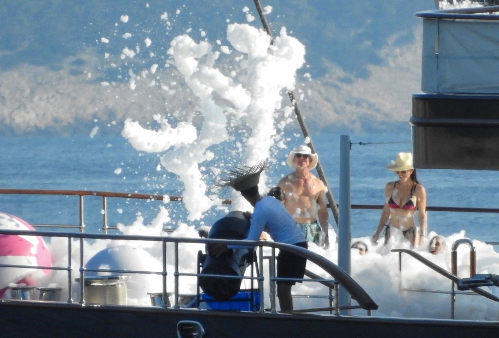 Jeff Bezos and Lauren Sánchez at a foam party on his yacht in Europe Sunday while celebrating Evan's 19th birthday. 
