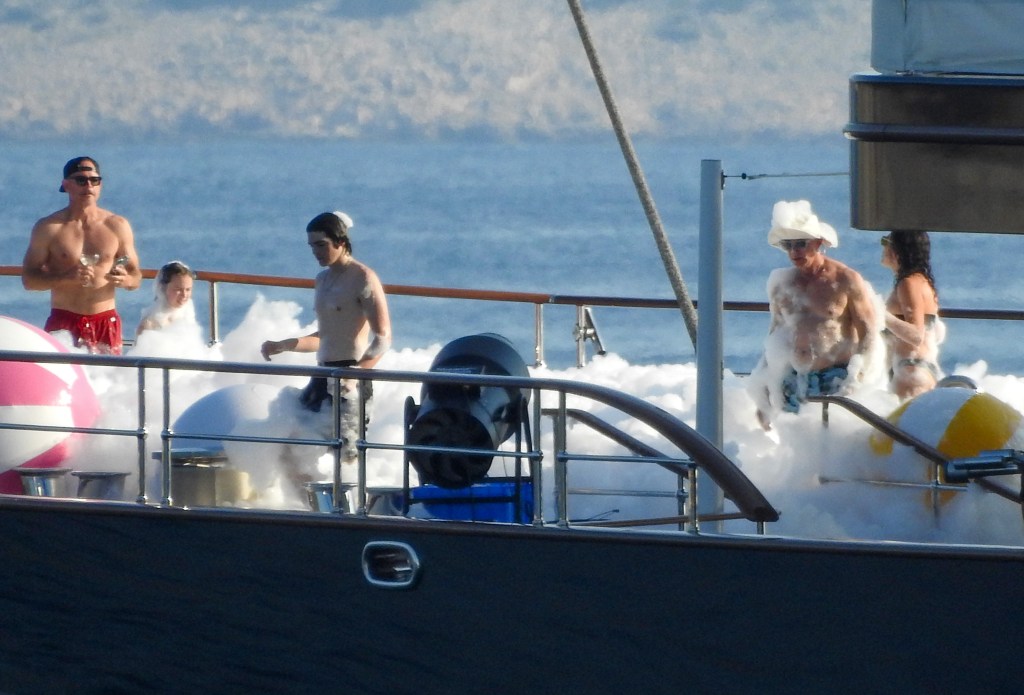 Jeff Bezos and Lauren Sánchez at a foam party on his yacht in Europe Sunday while celebrating Evan's 19th birthday. 