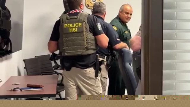 Sheriff Marcos R. Lopez's arrest by HSI agents.