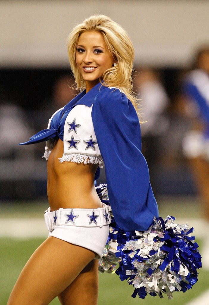 Sydney Durso of the Dallas Cowboys Cheerleaders performs at Cowboys Stadium on January 3, 2010 in Arlington, Texas.  
