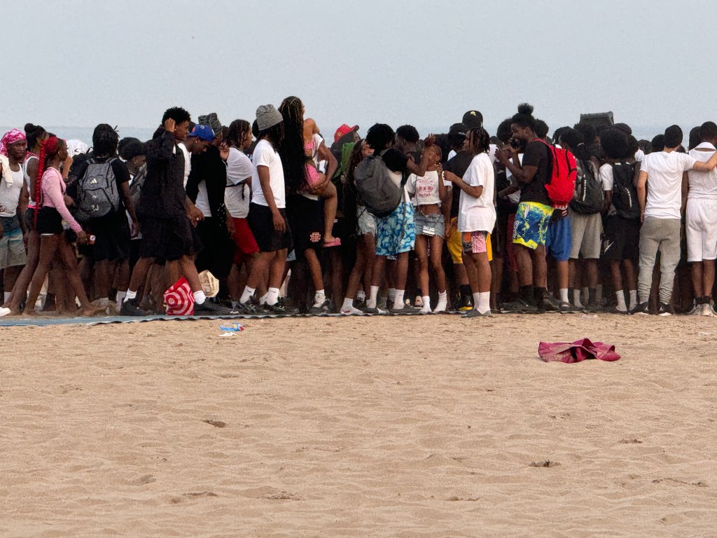 The fight erupted around 6:30 p.m. on the sand and along the historic Riegelmann Boardwalk near West 15th Street before spreading to surrounding streets