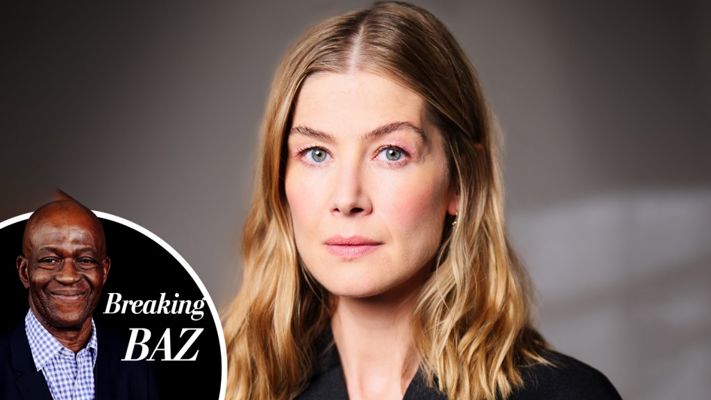 Breaking Baz: Here Comes The Judge! First Look At ‘Gone Girl’ Rosamund Pike Playing A Karaoke-Loving Justice In National Theatre Debut ‘Inter Alia’