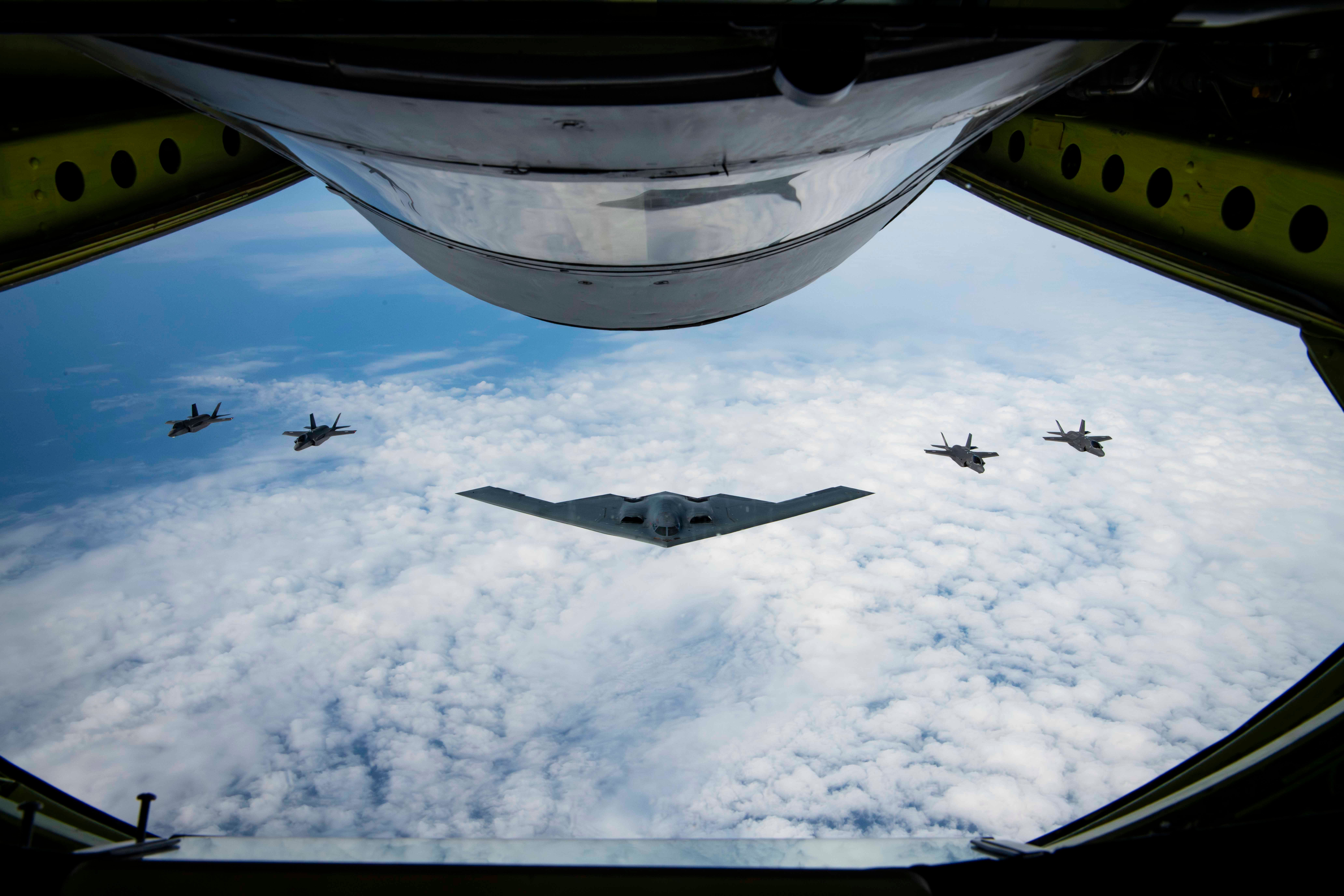 A US Air Force B-2 Spirit stealth bomber and four Japan Air Self-Defense Force F-35A Lightning IIs, fly in formation over the Indo-Pacific, Sept. 10, 2024.