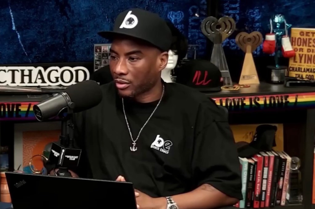Charlamagne Tha God speaking into a microphone.