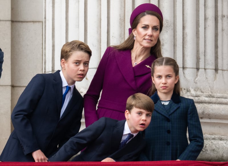 Prince George, Catherine, Princess of Wales, Prince Louis and Princess Charlotte watch the flypast to mark the 80th anniversary of VE Day on May 05, 2025 in London, England.