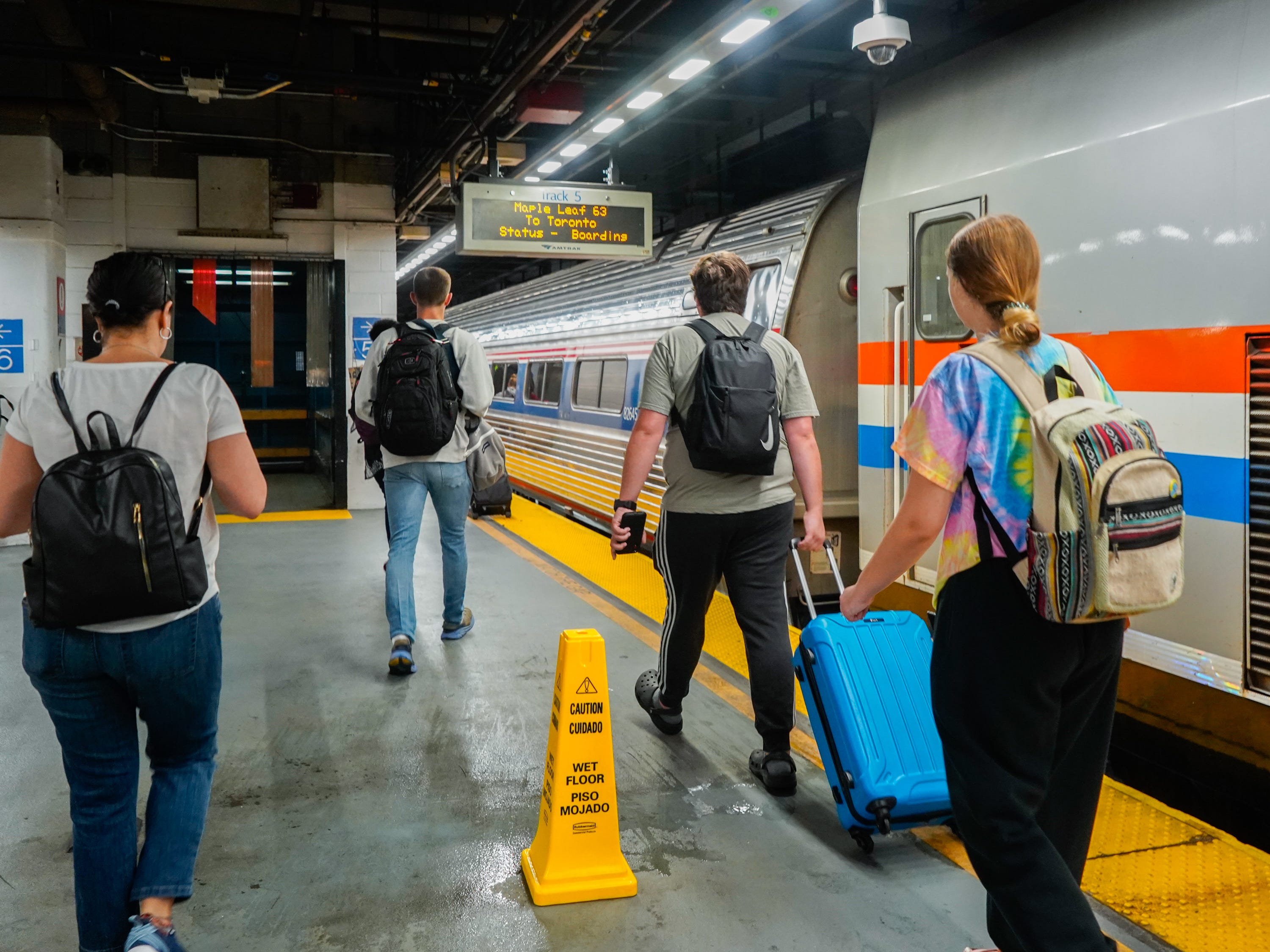 People board the Amtrak train