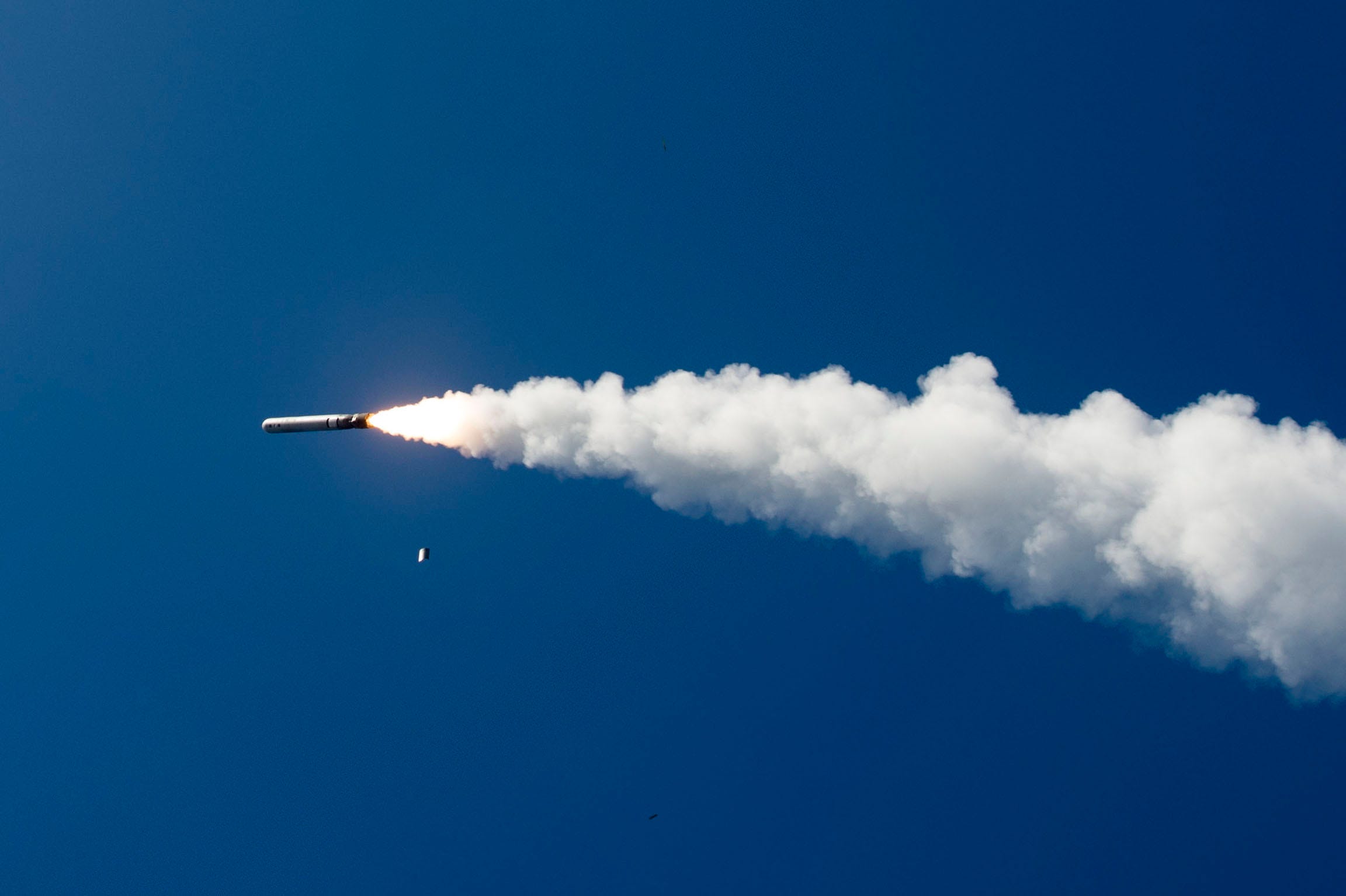 A Tomahawk cruise missile launches from the Arleigh Burke-class guided-missile destroyer USS Shoup (DDG 86) during a live-fire exercise as part of Valiant Shield 2018 in the Pacific Ocean, Sept. 18, 2018.