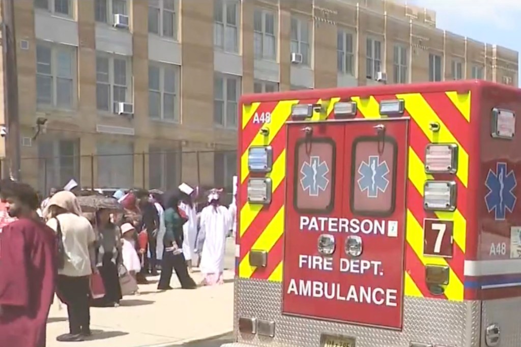 Paterson Fire Department ambulance at a graduation ceremony where people fainted from the heat.