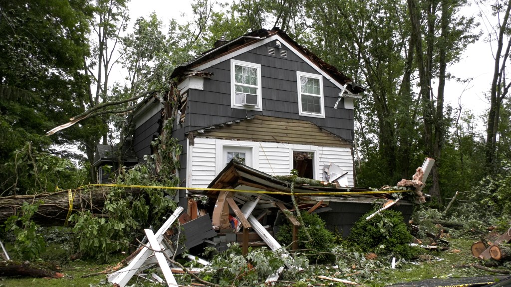 House damaged by fallen tree.
