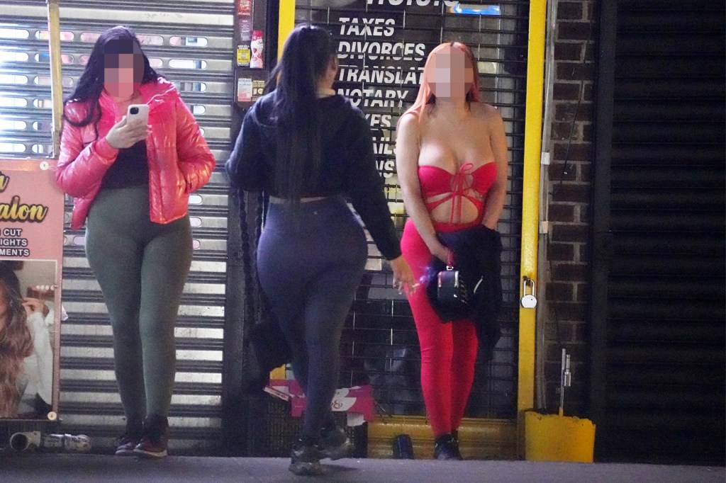 Three women believed to be sex workers standing on Roosevelt Avenue in Queens, NY.