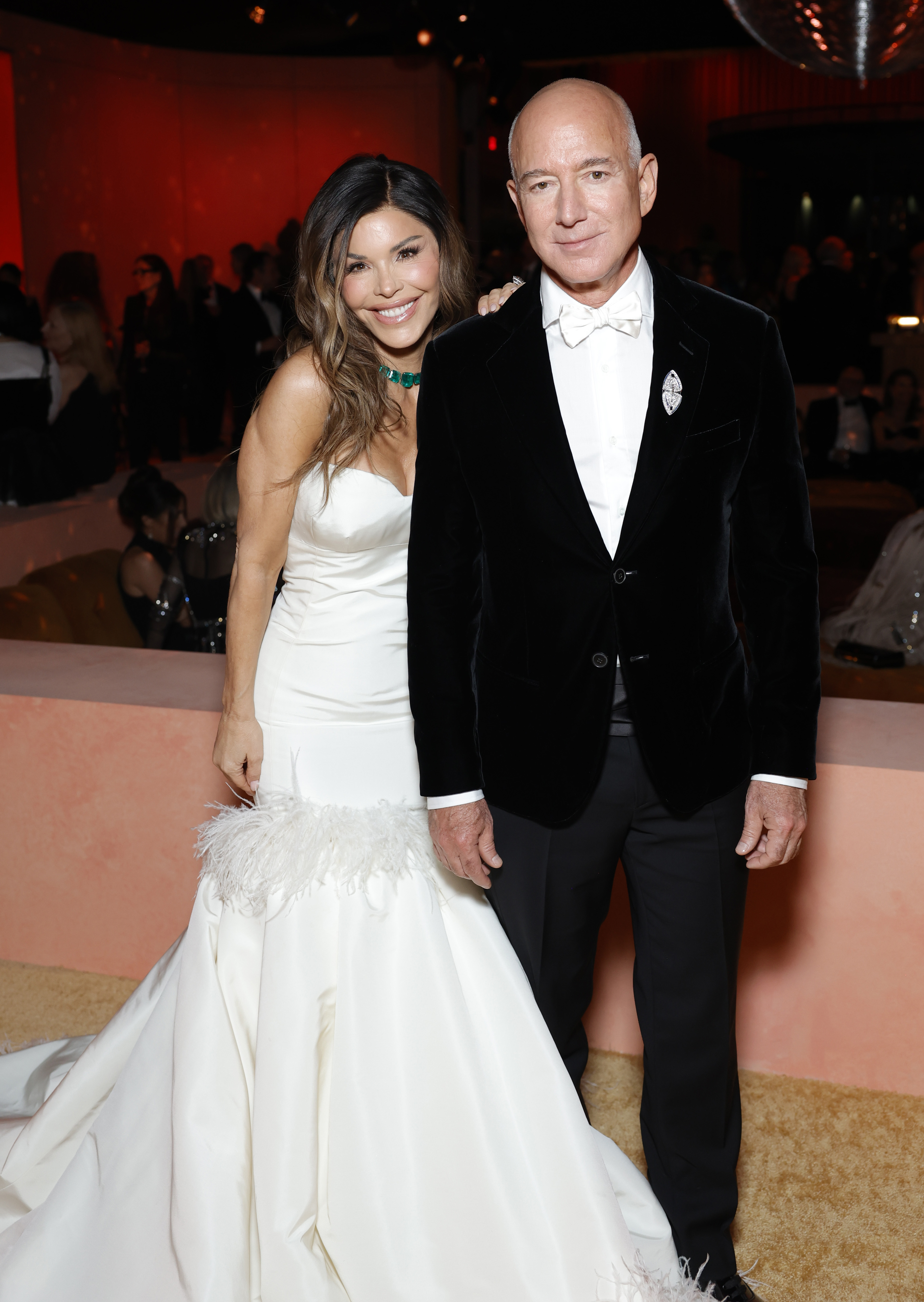 A photo of Lauren Sanchez and Jeff Bezos on the red carpet. 