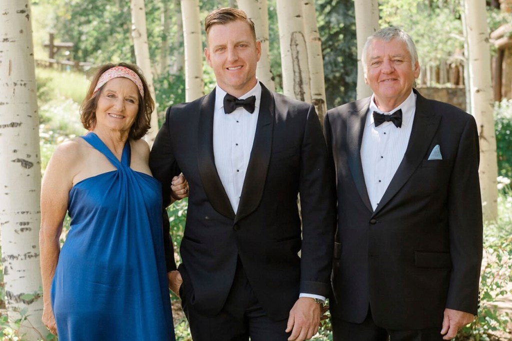 Josh Pickles, Terry Pickles, and Paula Bozinovich at a wedding.