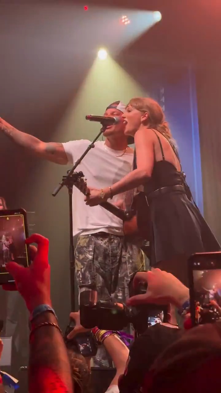 Taylor Swift performing live at Tight Ends and Friends in Nashville.