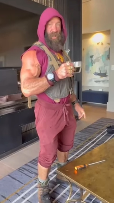 Minutes before his arrest, Johnson is seen frantically pacing around the living room with meditation music playing, talking about going to “prison,” being “arrested,” and “fighting” Rogan.
