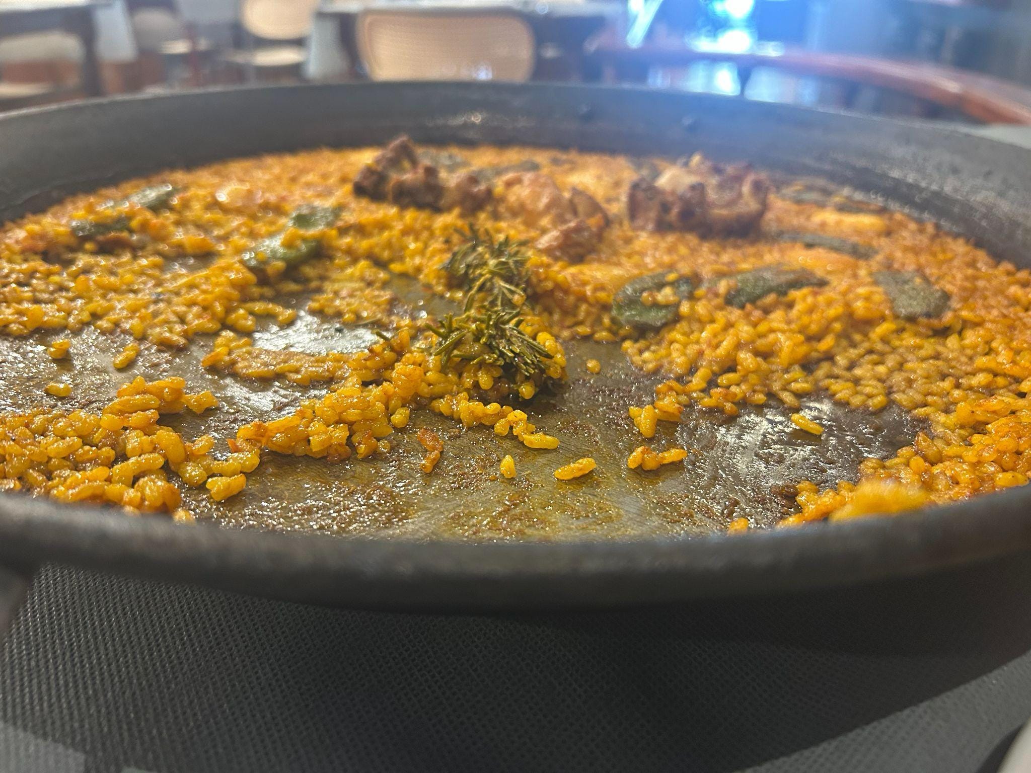 A mostly-eaten plate of paella.