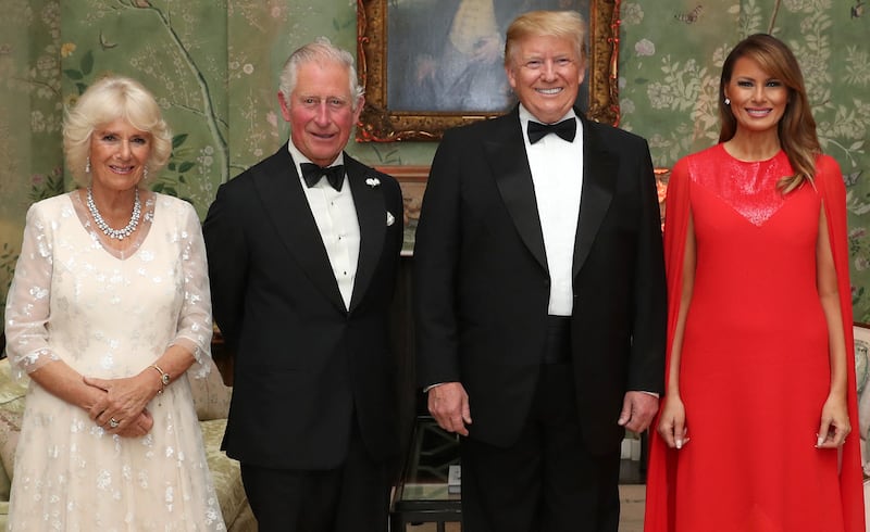 US President Donald Trump (2R), US First Lady Melania Trump (R), Britain's Prince Charles, Prince of Wales (2L), and his wife Britain's Camilla, Duchess of Cornwall in 2019.