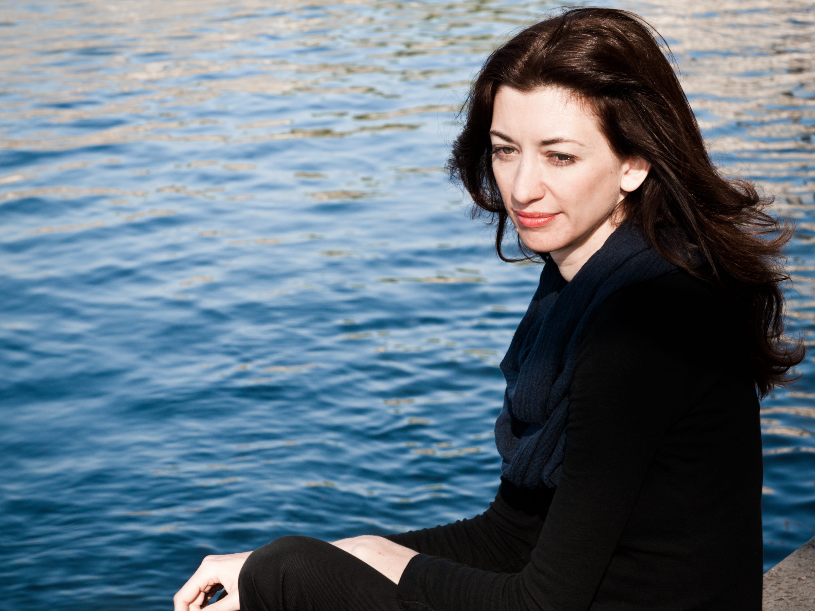Author Kasia Dietz next to water
