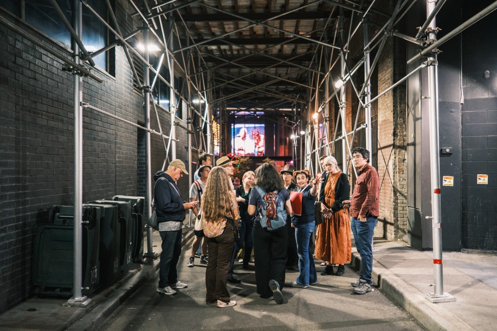 Visitors check out one of the rat-tastic stops on the tour.