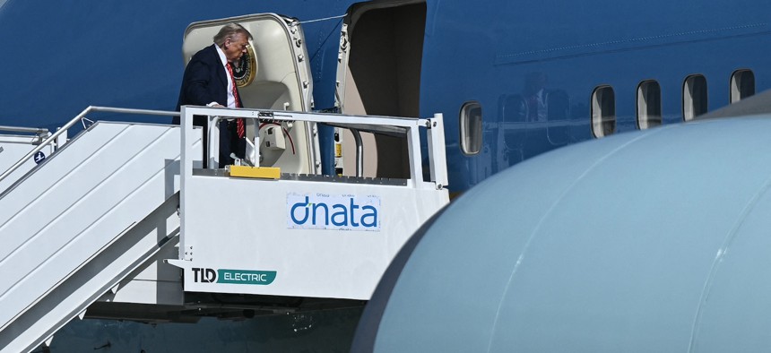 President Donald Trump boards Air Force One after attending a NATO summit, in The Hague, Netherlands, on June 25, 2025. 
