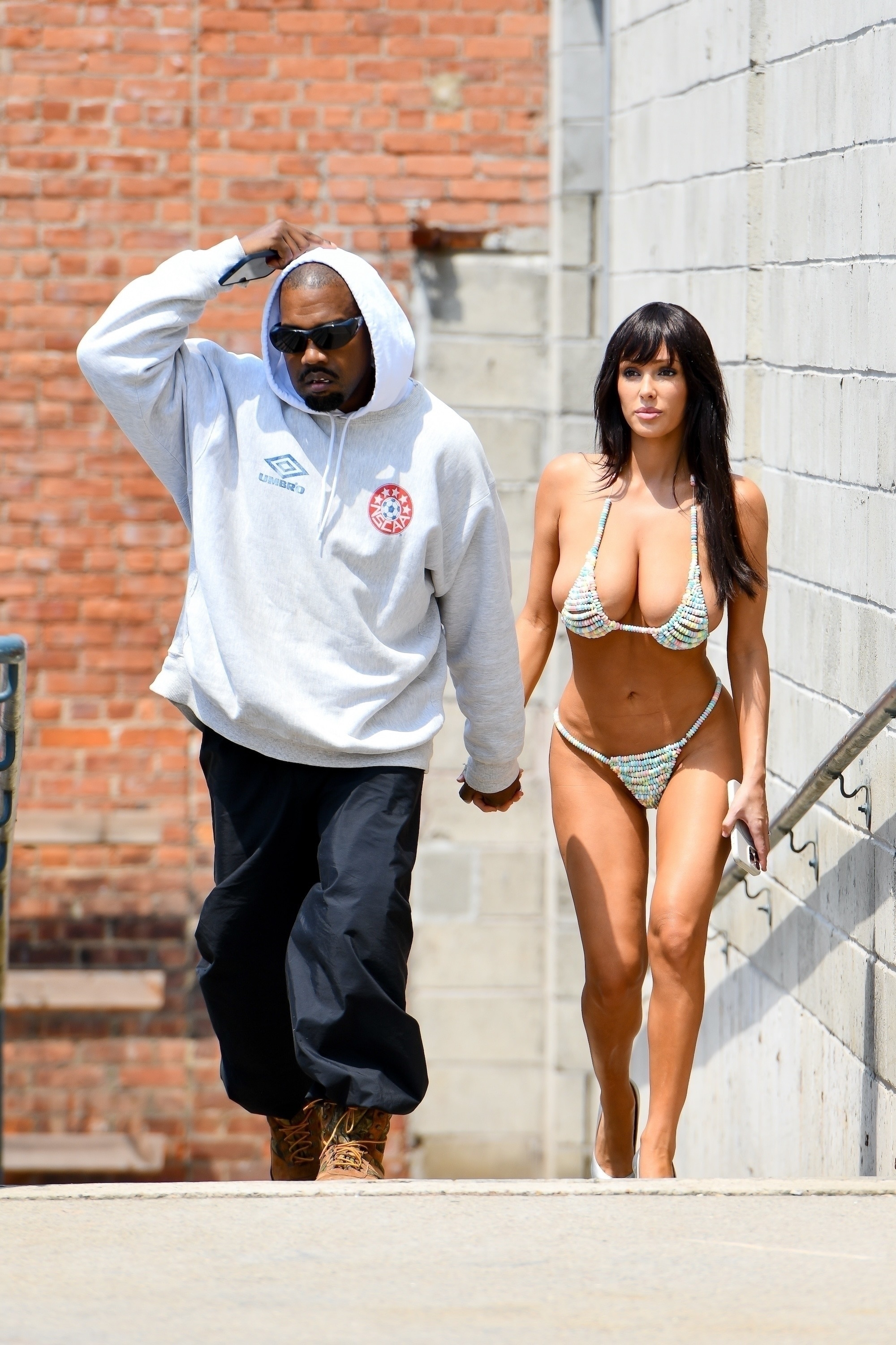 Kanye West and candy lingerie clad Bianca Censori in New York. 