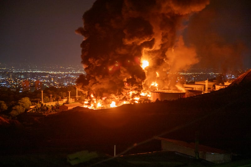 Fire and smoke rise into the sky after an Israeli attack on the Shahran oil depot in Tehran, Iran.