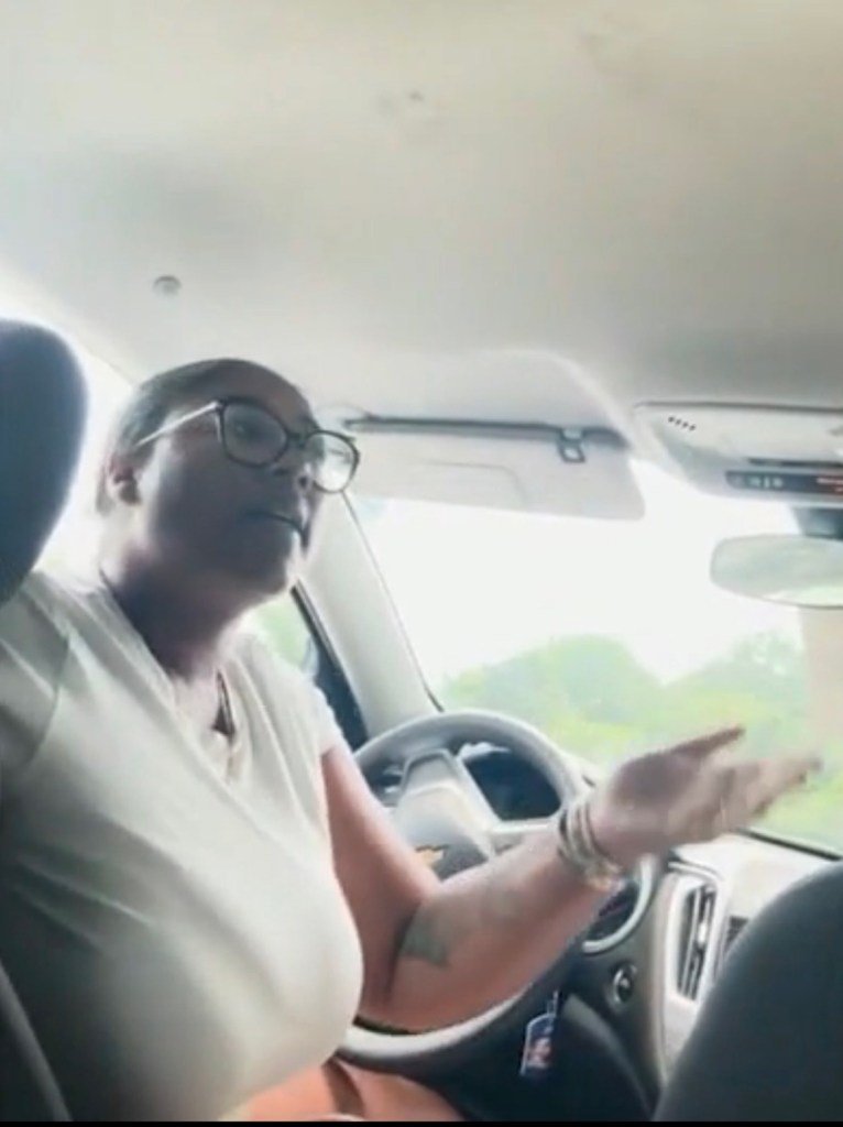 Uber driver Nicole Smith sitting in the driver's seat during the incident on I-85 on June 21, 2025.
