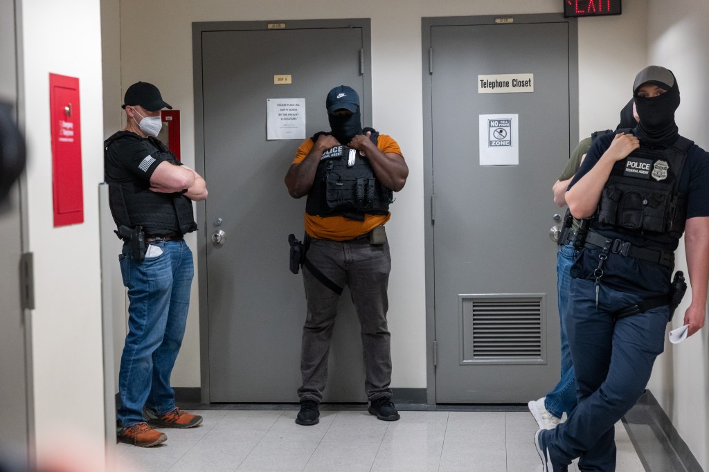 Federal agents are stationed at immigration court in New York City.