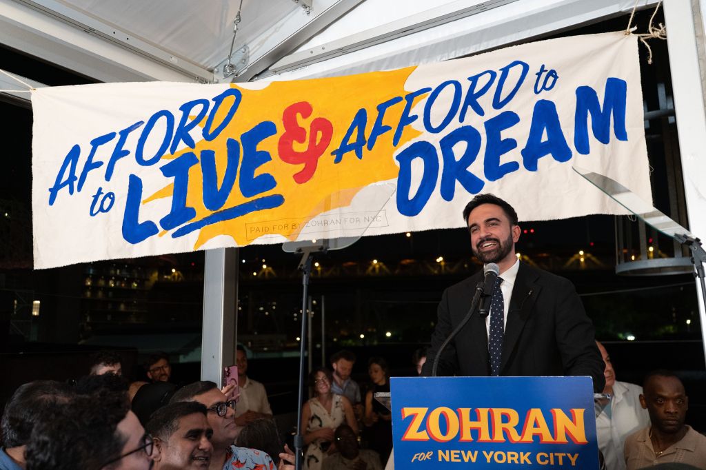 Zohran Mamdani giving a speech at his election night party.